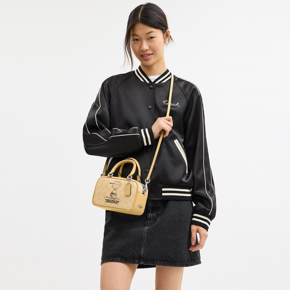 Coach X Peanuts Satchel Crossbody Bag In Signature Canvas With Charlie Brown - Picture 2 of 14